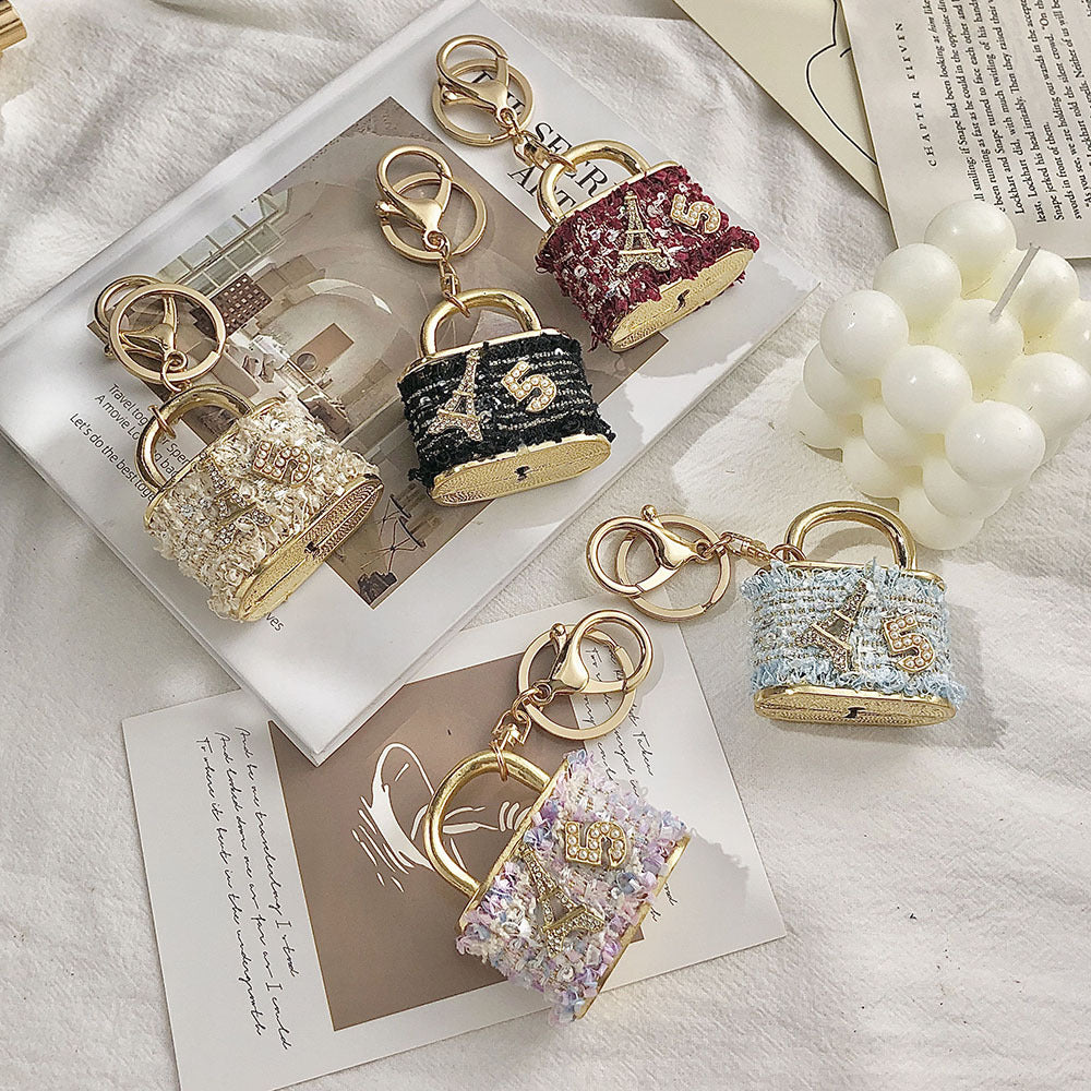 SISSLIA European and American creative small gift bag key chain lock shape pendant metal key chain pendant