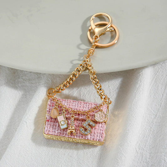 SISSLIA Eye-catching Light Luxury Fashionable Unique Design Creative Woven Plaid Bag Keychain Small Pendant Metal Keychain Pendant