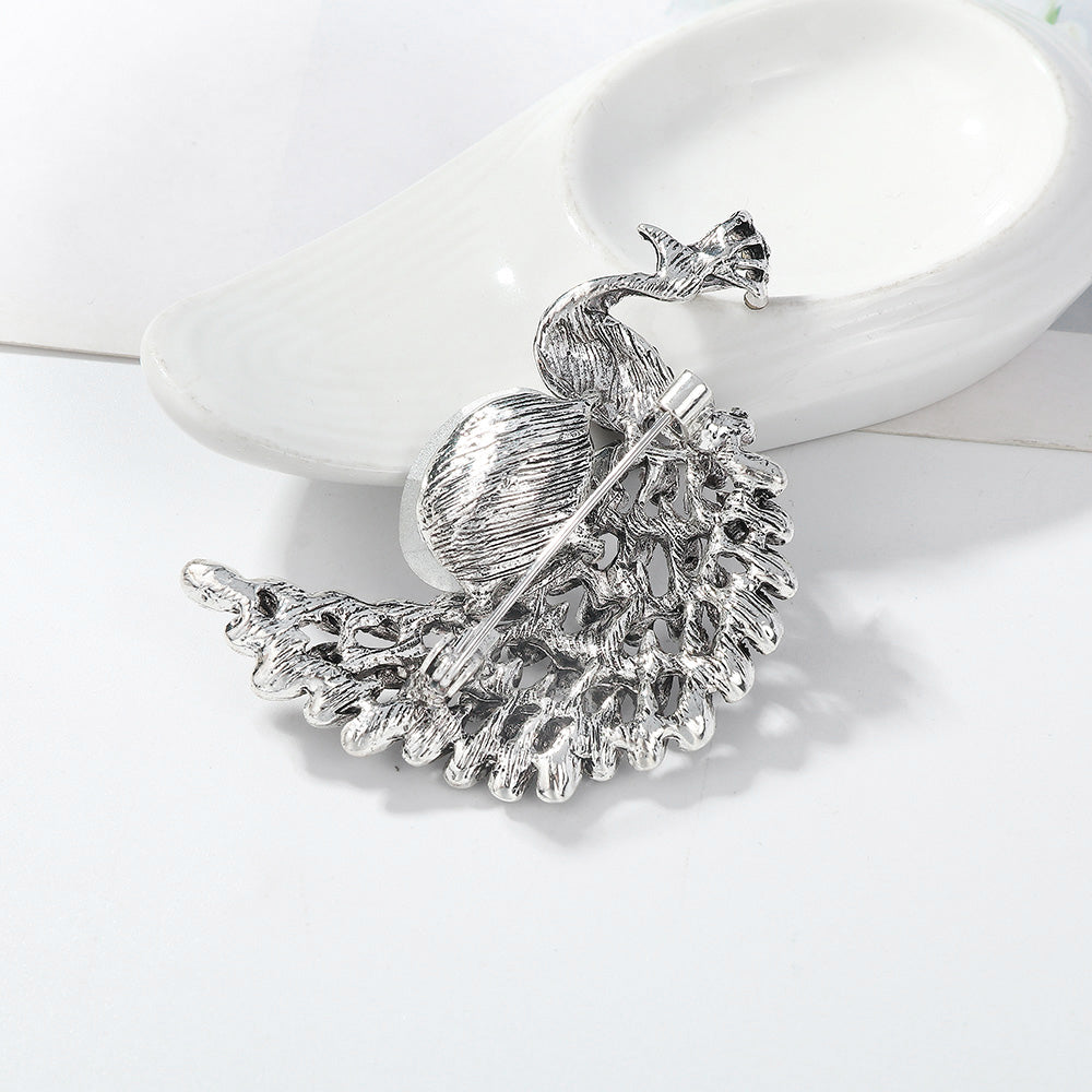 Flash Peacock Brooch