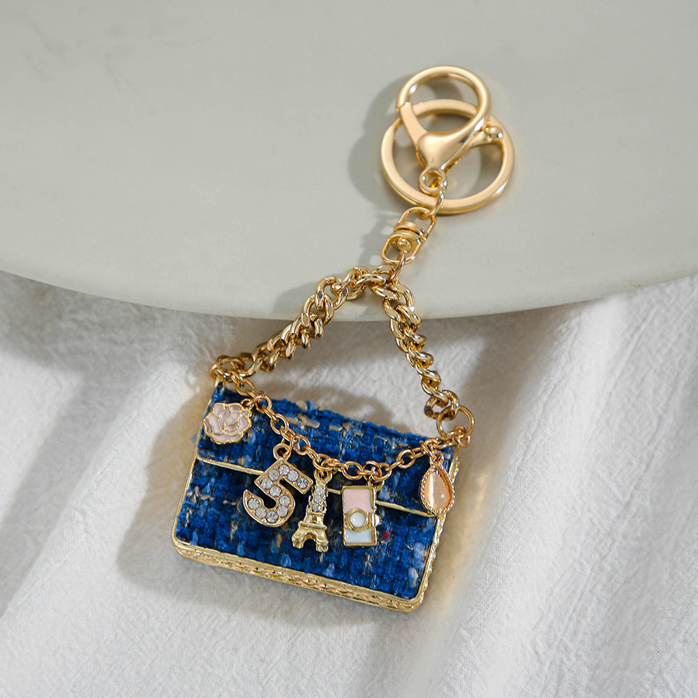 SISSLIA Eye-catching Light Luxury Fashionable Unique Design Creative Woven Plaid Bag Keychain Small Pendant Metal Keychain Pendant