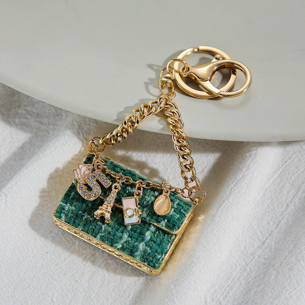 SISSLIA Eye-catching Light Luxury Fashionable Unique Design Creative Woven Plaid Bag Keychain Small Pendant Metal Keychain Pendant