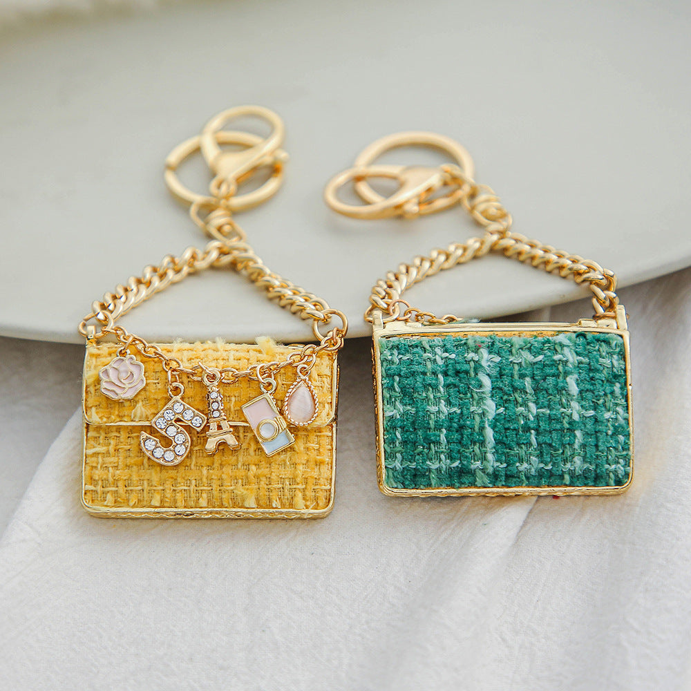 SISSLIA Eye-catching Light Luxury Fashionable Unique Design Creative Woven Plaid Bag Keychain Small Pendant Metal Keychain Pendant